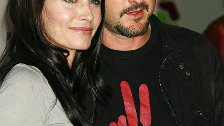 2520_cox_arquette_fly