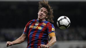 Carles Puyol bo tudi danes ena od zadnjih ovir za Realove nogometaše. (Foto: Reu