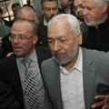 Rachid Ghannouchi je dočakal topel sprejem na letališču v Tunisu. (Foto: EPA)