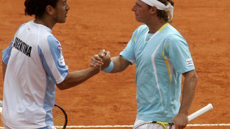 Argentinca David Nalbandian in Guillermo Canas sta priigrala drugo točko.