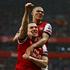 Podolski Gibbs Arsenal Norwich City Premier League Anglija liga prvenstvo