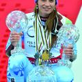 epa03629062 Tina Maze of Slovenia poses with the crystal globe as the winner of 