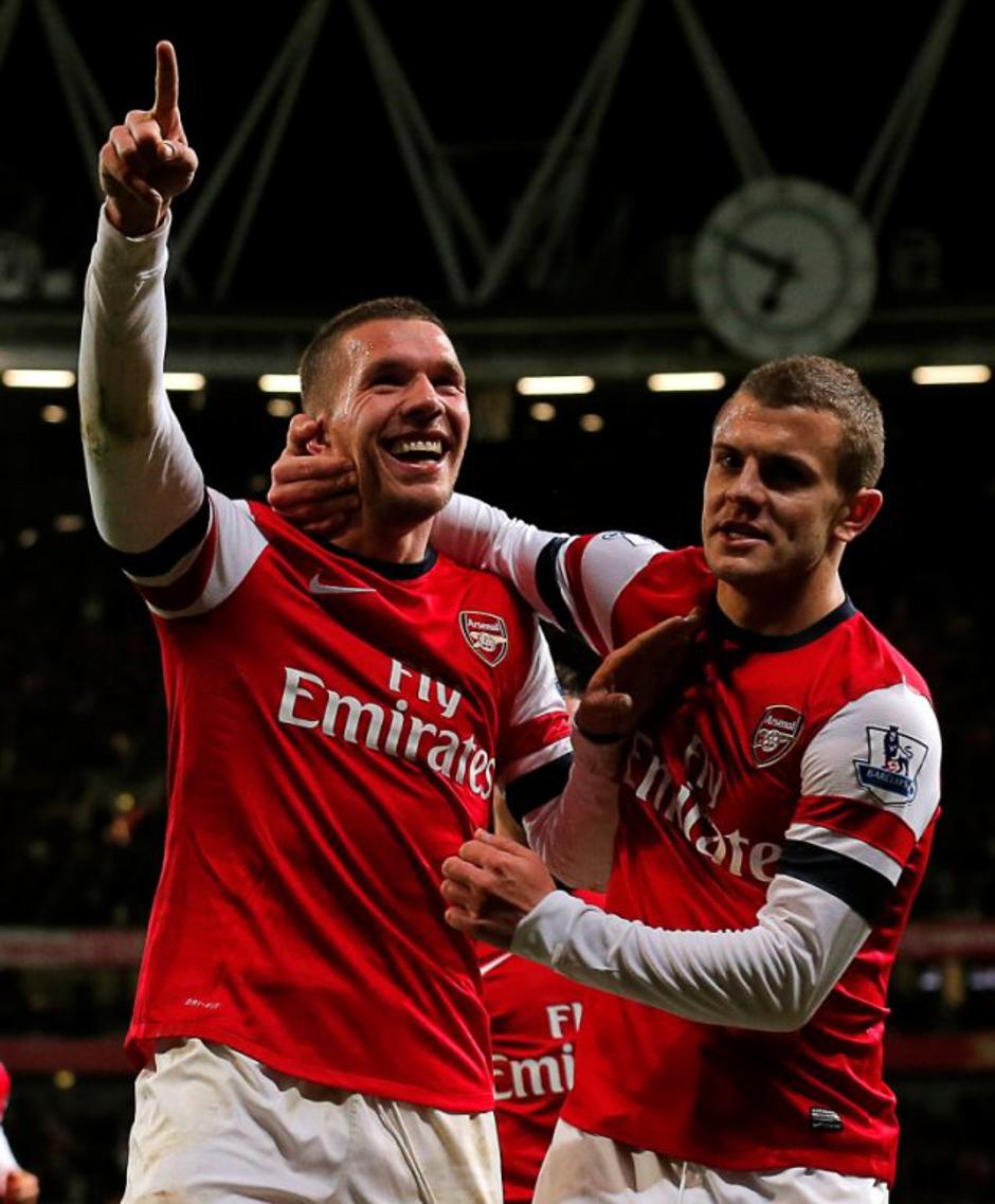 Podolski Wilshere Arsenal Newcastle United Premier League Anglija liga prvenstvo | Avtor: EPA