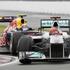 Michael Schumacher (Mercedes) in Mark Webber (Red Bull)