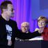 Bono in Angela Merkel