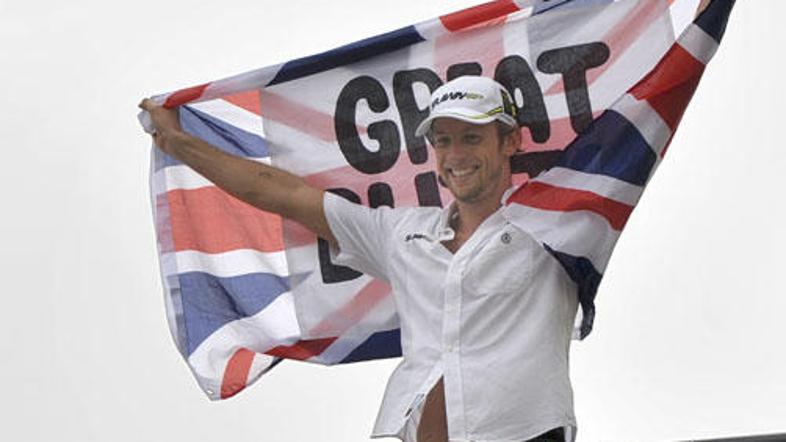 Button bo v novi sezoni formule 1 sedel v dirkalniku moštva McLaren. (Foto: Reut