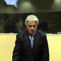 Čeprav naj bi se Karadžić s Holbrookom dogovoril o imuniteti, so pri njegovi are