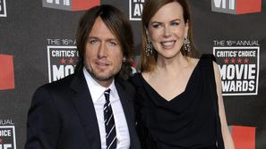 Par se je za nadomestno mater odločil zaradi zapletov v prvi nosečnosti. (Foto: 