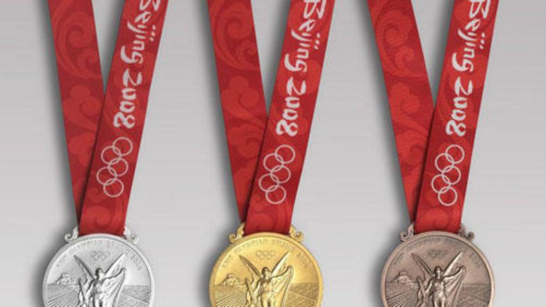 Kitajska ima že 41 kolajn (26 zlatih), ZDA pa 46, Slovenija srebro in bron.