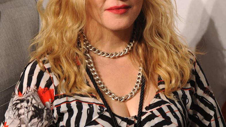 Madonna je po navedbah predstavnice predana pomoči otrokom na Malaviju. (Foto: E