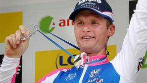 Grega Bole je v cilj prikolesaril v času zmagovalca. (Foto: Reuters)