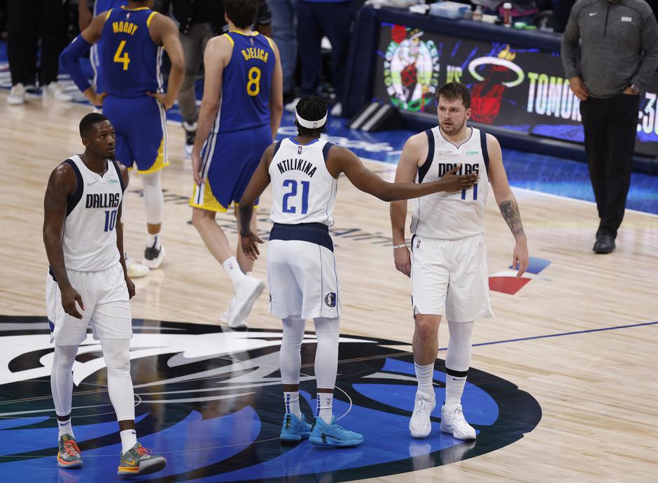 Frank Ntilikina in Luka Dončić | Avtor: Epa