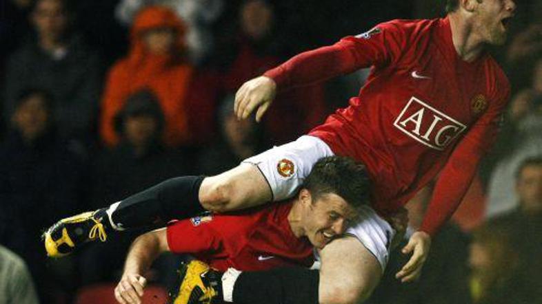 Michael Carrick (na fotografiji spodaj) je bil ob Carlosu Tevezu velik junak zma