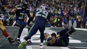 Malcolm Smith prestrežena žoga Seattle Seahawks San Francisco 49ers